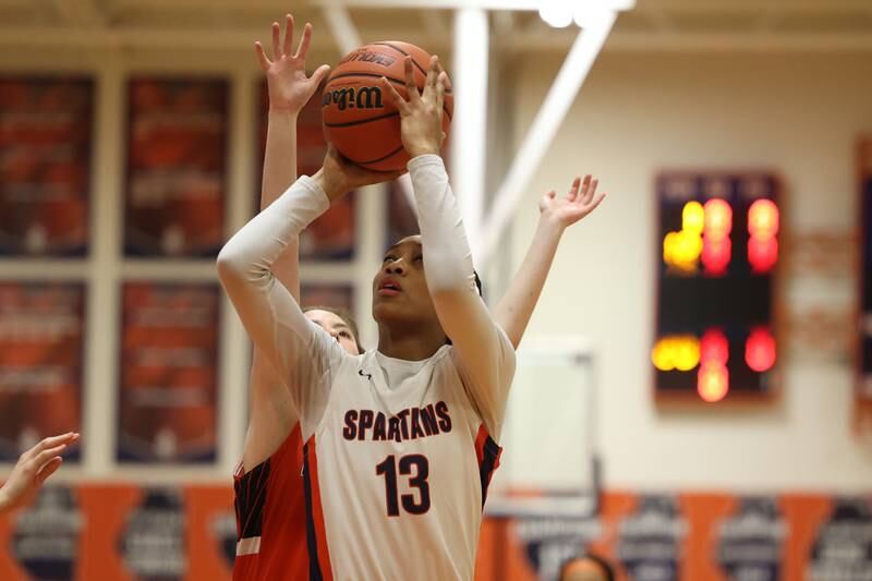 Romeoville’s Jadea Johnson takes a shot against Minooka on Tuesday January 24th, 2023.