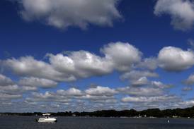 2 rescued after boat flips over on Crystal Lake