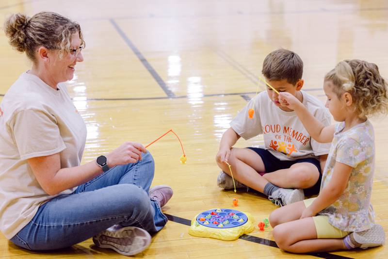 The Sideline Squad held a practice run at McHenry's Duker Elementary School on Monday, Aug. 26, 2024, including the wristbands, drop off and pickup procedures. The club allows parents to watch older siblings' games while paying to give children 3-12 an alternative activity.