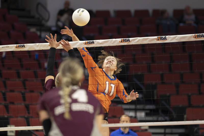 Genoa-Kingston’s Lily Mueller works the net Friday, Nov. 11, 2022 in the class 2A semifinal game against IVC.