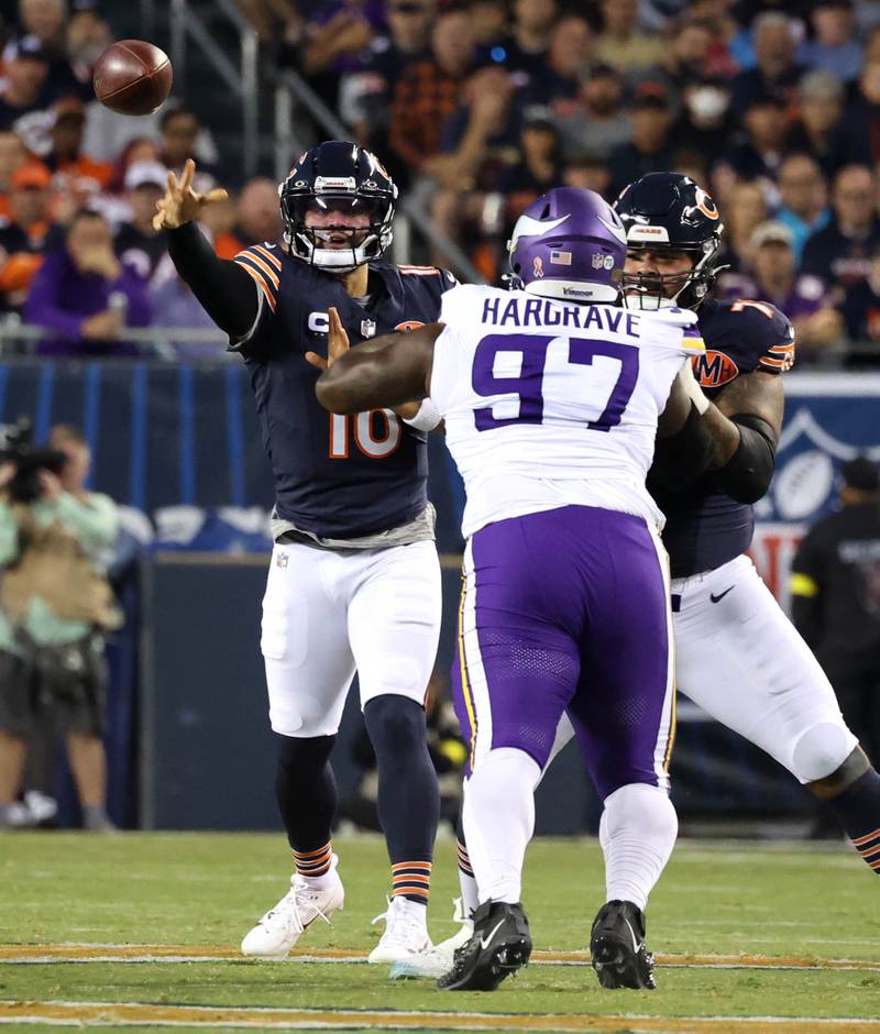 Chicago Bears quarterback Caleb Williams gets good pass protection as he throws a pass over Minnesota Vikings defensive lineman Javon Hargrave during their game Monday, Sept. 8, 2025, at Soldier Field in Chicago.