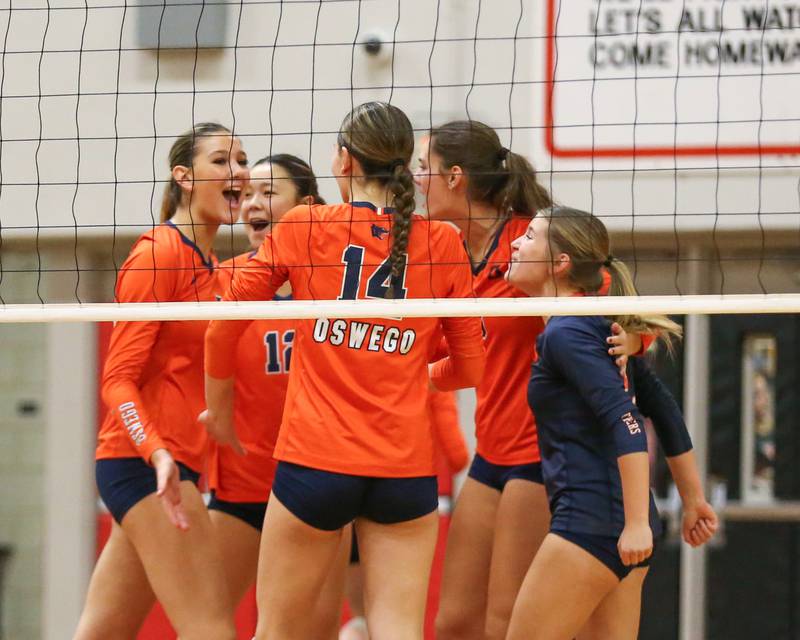 Oswego celebrates a point during Class 4A Bolingbrook Sectional semifinal match between Joliet West at Oswego.  Nov 5, 2024  in Bolingbrook.