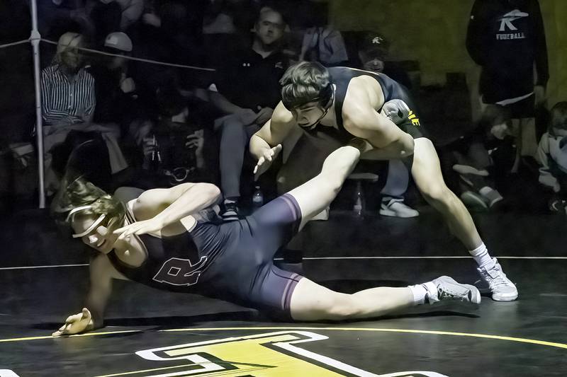 Riverdale's Collin Altensey (right) takes down Rockridge's Ryan Lower during the 160-pound title bout at the 1A Riverdale Regional on Saturday, Feb. 4, 2023.