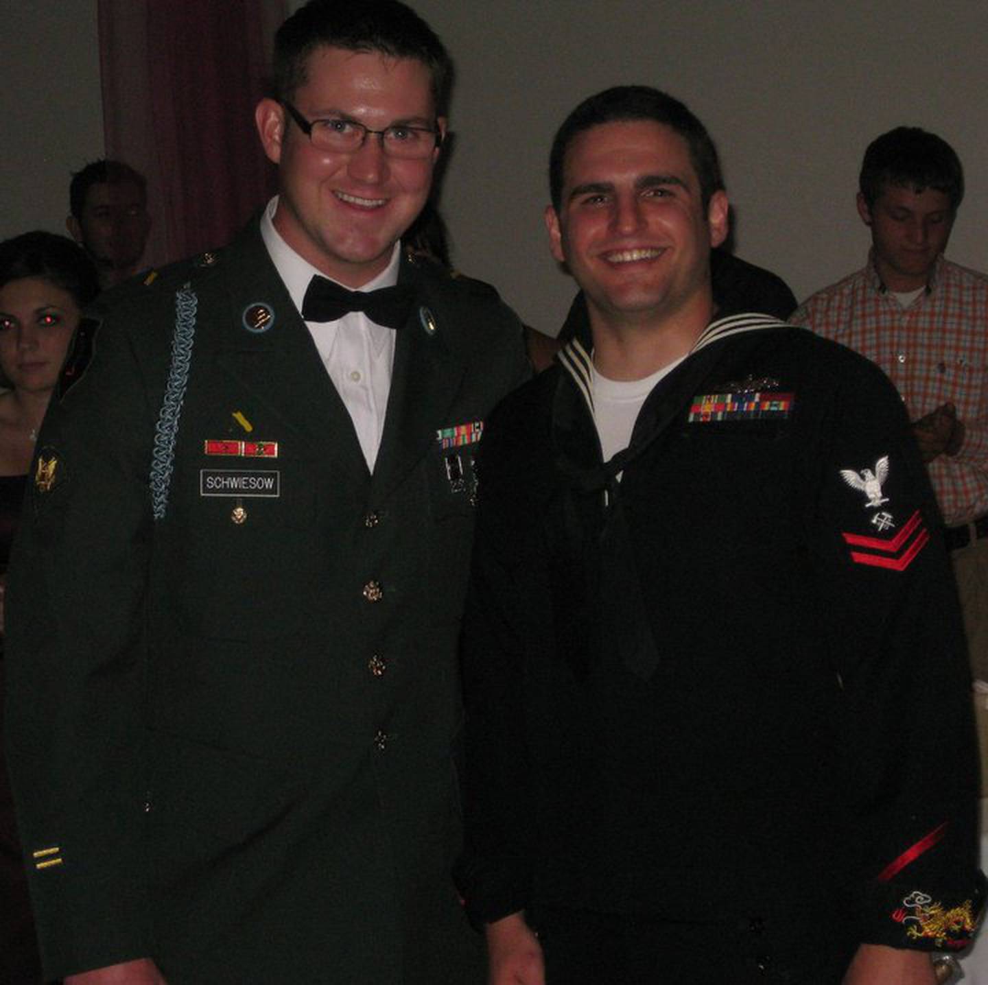 Rob Schwiesow and Nick Wickman in their military uniforms.