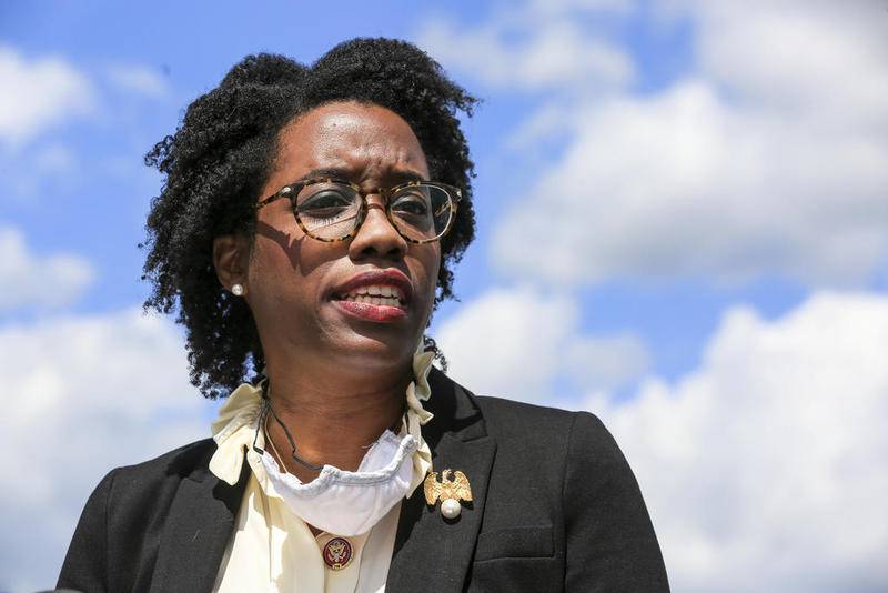 U.S. Rep. Lauren Underwood, D-Naperville, can be seen speaking to the media on Tuesday, Aug. 18, 2020, during a press conference condemning President Donald Trump's effort to limit the United States Postal Service.