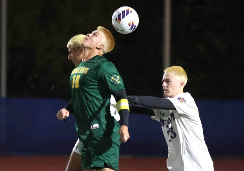Coal City's Julian Micetich heads the ball in front of Mendota's Alex Beetz Thursday, Nov. 6, 2025, during their Class 1A state semifinal game at Hoffman Estates High School.