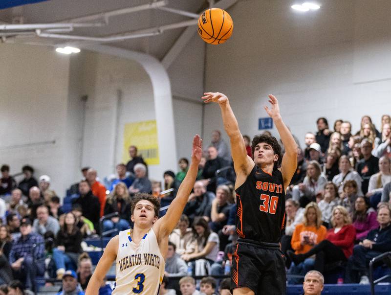 Wheaton Warrenville South’s Luca Carbonaro shoots a two-point field goal during a game against Wheaton North on Friday, Dec. 20, 2024.