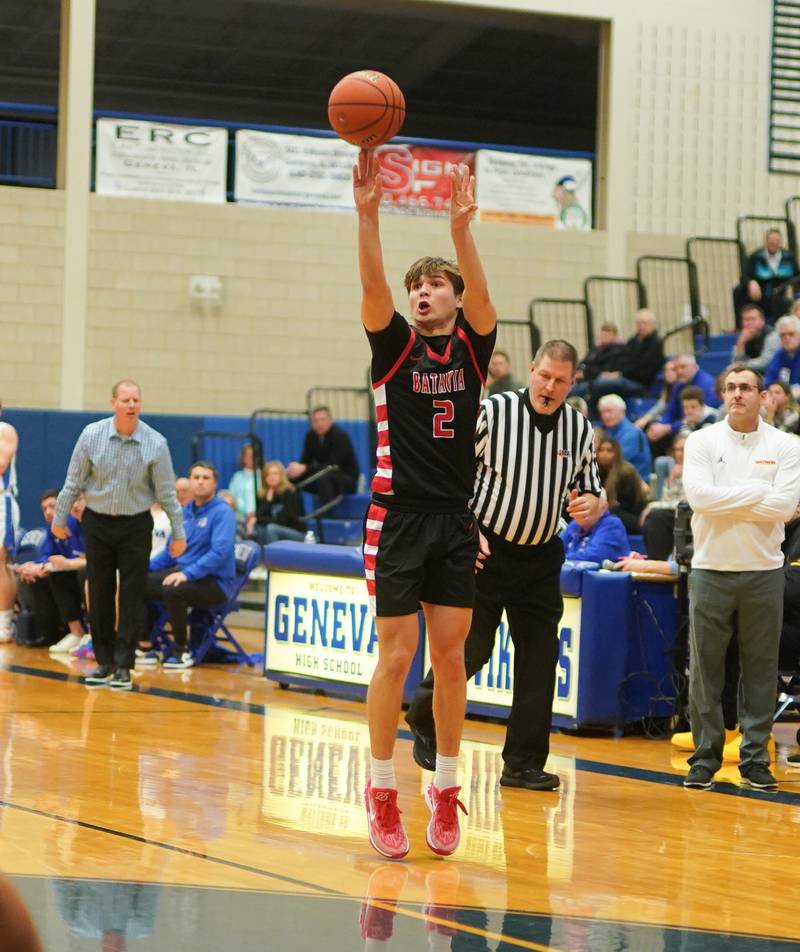 Batavia's Jacob Aseltine (2) shoots a three pointer against Geneva during a basketball game at Geneva High School on Friday, Dec 15, 2023.