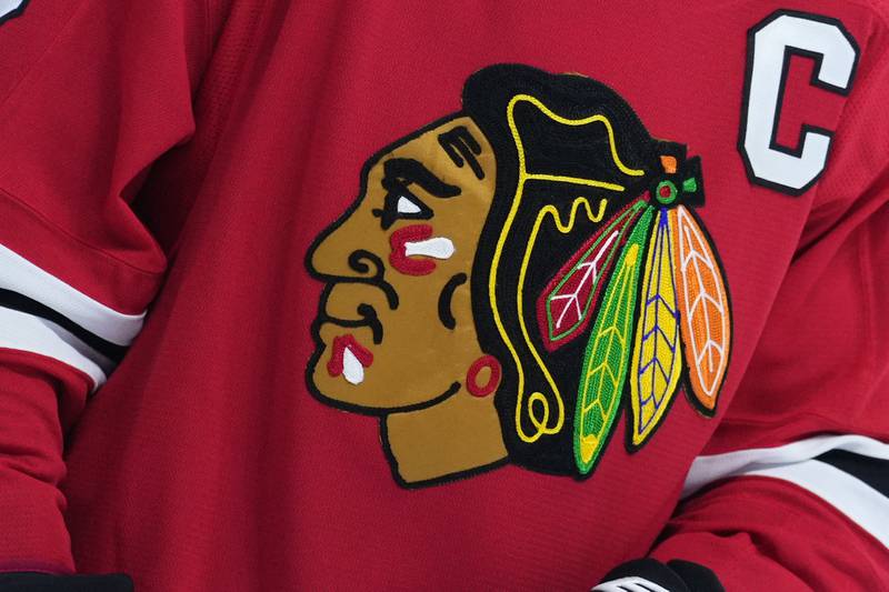 FILE - The Chicago Blackhawks' logo is seen during an NHL hockey game on Jan. 19, 2023, in Philadelphia. The Blackhawks will not wear Pride-themed warmup jerseys before Sunday's March 26, 2023, Pride Night game against Vancouver because of security concerns involving a Russian law that expands restrictions on activities seen as promoting LGBTQ rights in the country. (AP Photo/Matt Slocum, File)