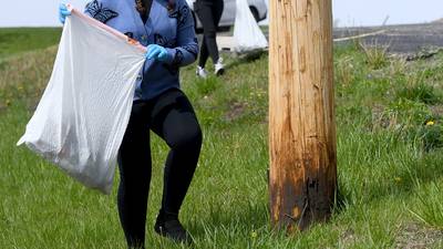 La Salle-Peru High School students clean up neighborhood near campus for Earth Day