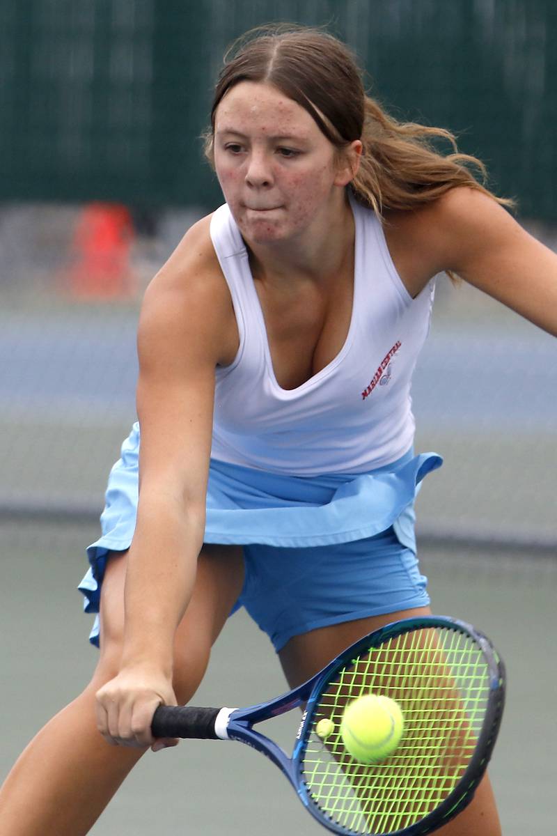 Marian Central’s Kaitlyn Remke returns the ball Thursday, Oct. 19, 2023, during the first day of the IHSA State Girls Tennis Tournament at Hersey High School in Arlington Heights.
