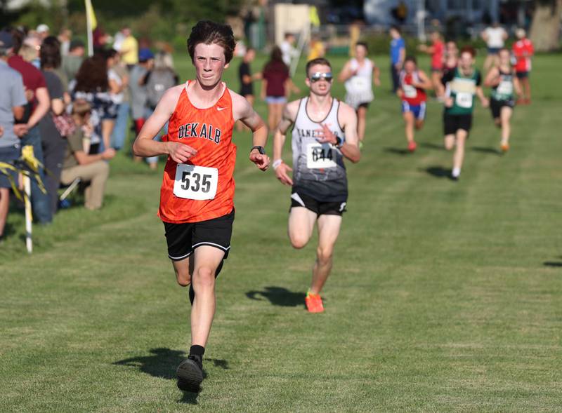 DeKalb’s Will Greer finishes the varsity race Tuesday, Sept. 2, 2025, during the Sycamore Cross Country Invitational at Northern Illinois University in DeKalb.