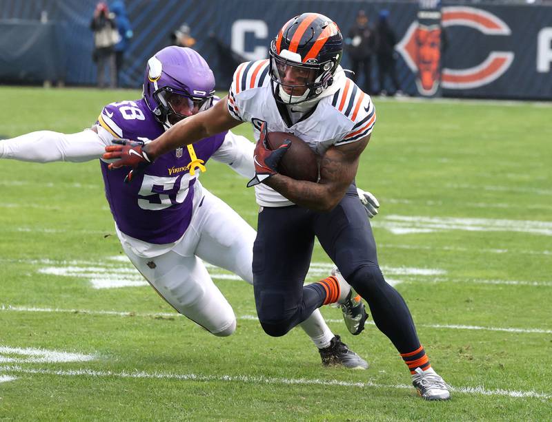 Chicago Bears wide receiver DJ Moore gets by Minnesota Vikings linebacker Jonathan Greenard for a touchdown during their game Sunday, Nov. 24, 2024, at Soldier Field in Chicago.