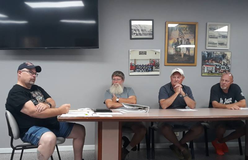Reading Fire Protection District Treasurer Tom Metzke (left) talks Tuesday, Sept. 20, 2022, about the finances of a possible intergovernmental agreement with the city of Streator for emergency ambulance service.
