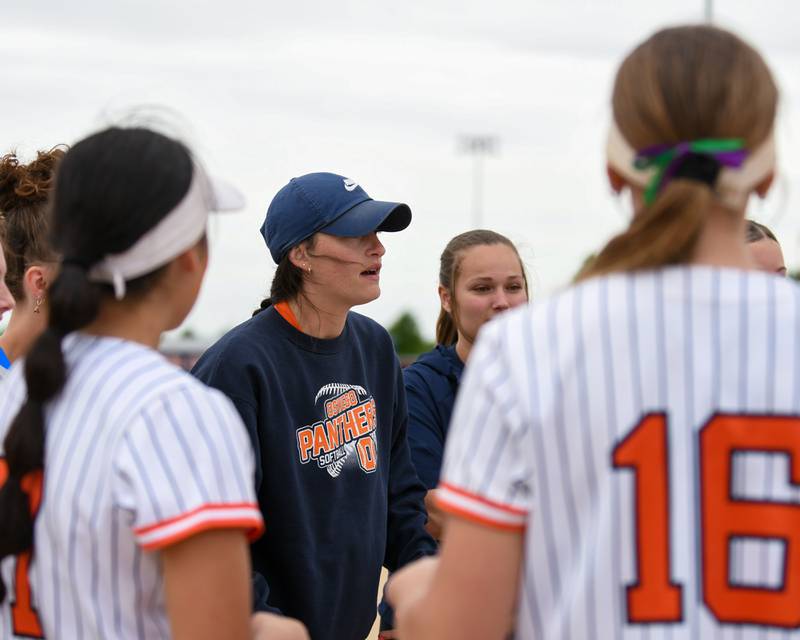 Oswego's head coach Annie Scaramuzzi talks to the team after taking the win over Benet Academy during  the regional final game on Friday May 22, 2026, that was held at Oswego High School.