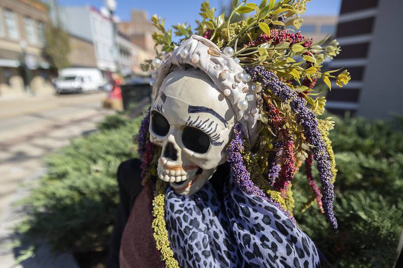 Refined Boutique dolls up a spooky figure for their scarecrow.