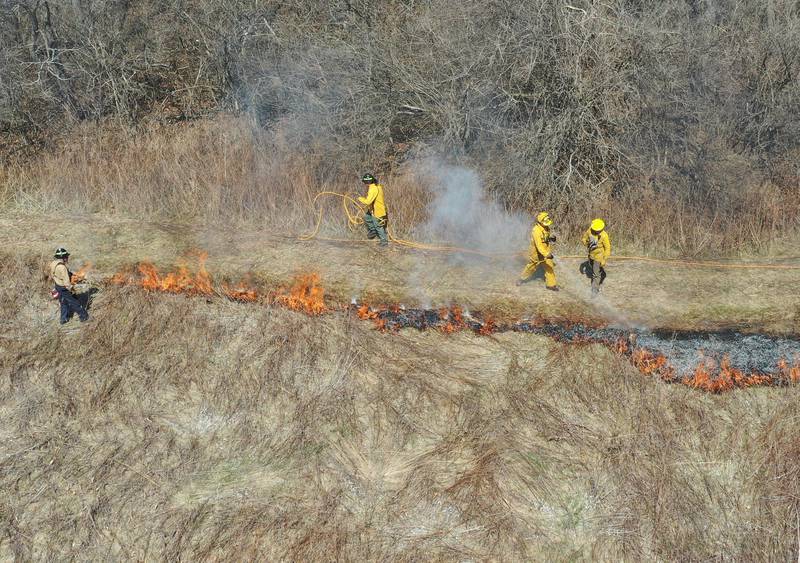 The Illinois Department of Natural Resources conduct a controlled burn on Monday, March 30, 2026 across from Deer Park Golf Club near Oglesby. Approximately 300 acres of prairie were burned during the planned during the burnoff. The burning of the prairie helps maintain a healthy grassland and prevent invasive plants.