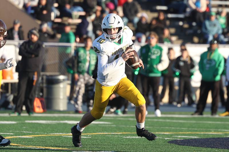 Providence’s Leo Slepski rolls out to pass against Joliet Catholic in the Class 5A semifinal on Saturday, Nov. 18, 2023, in Joliet.