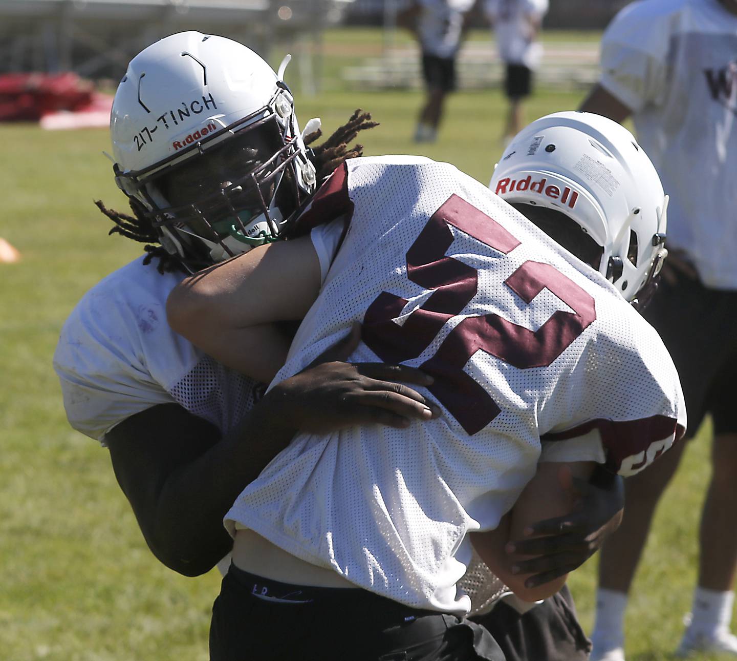Prairie Ridge’s Gavin Tinch fights through a block during football practice Monday, July 1, 2024, at Prairie Ridge High School .