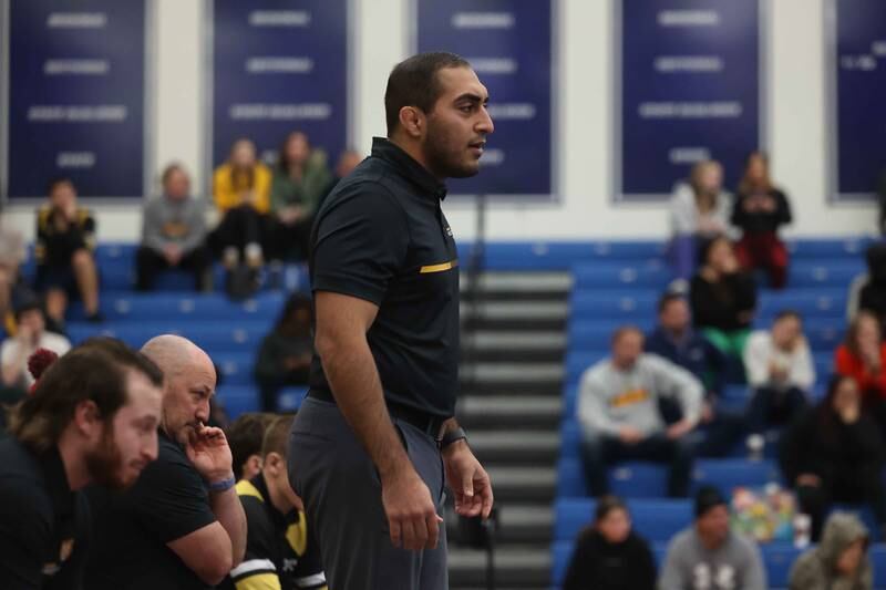 Joliet West head coach Awais Arain watches one of the matches Plainfield South on Wednesday, Dec. 11, 2024 in Plainfield.