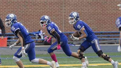 Newman gets 3 interceptions in complete postseason win over Ridgeview/Lexington