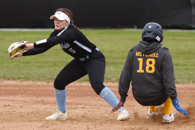 Kankakee's Lillian Landis, left, fields a late throw as Thornwood's Armani Mitchell slides into second base during a game at Kankakee Thursday, April 17, 2025.