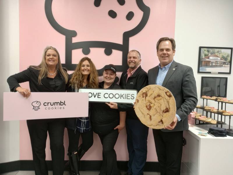 Kane County officials visited the new Crumbl Cookies store in Geneva Thursday, Nov. 9. Board Member Michelle Gumz (left), Leslie Juby, General Manager of the Geneva store Ashley Strom, Board Member Bill Tarver and Geneva Mayor Kevin Burns welcomed the new business to the area.