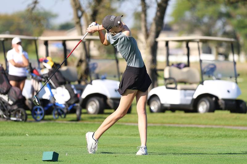 Lincoln-Way West's Sydney Pohlmann drives off hole one in the 2A Rich Township Regional girls golf tournament on Tuesday, Sept. 30, 2025 in University Park.