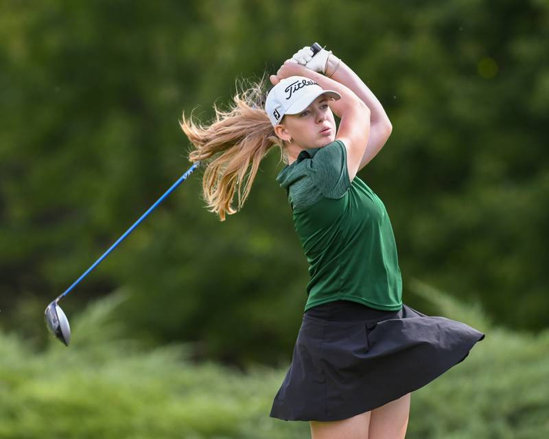 Kaylee Adelmann of Plainfield Central watches her shot after teeing off during the Southwest Prairie conference meet on Wednesday Sept. 24, 2025, held at Blackberry Oaks Golf course in Bristal.