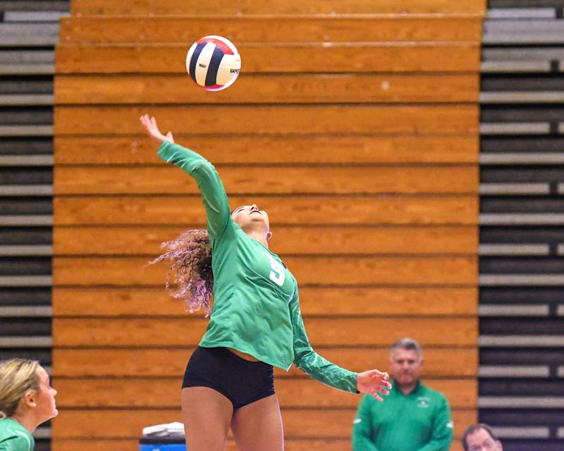 York's Ariella Villatoro Nevarez (9) spikes the ball over the net during the regional title game against Lyons Township on Thursday Oct. 30, 2025, held at York High School.