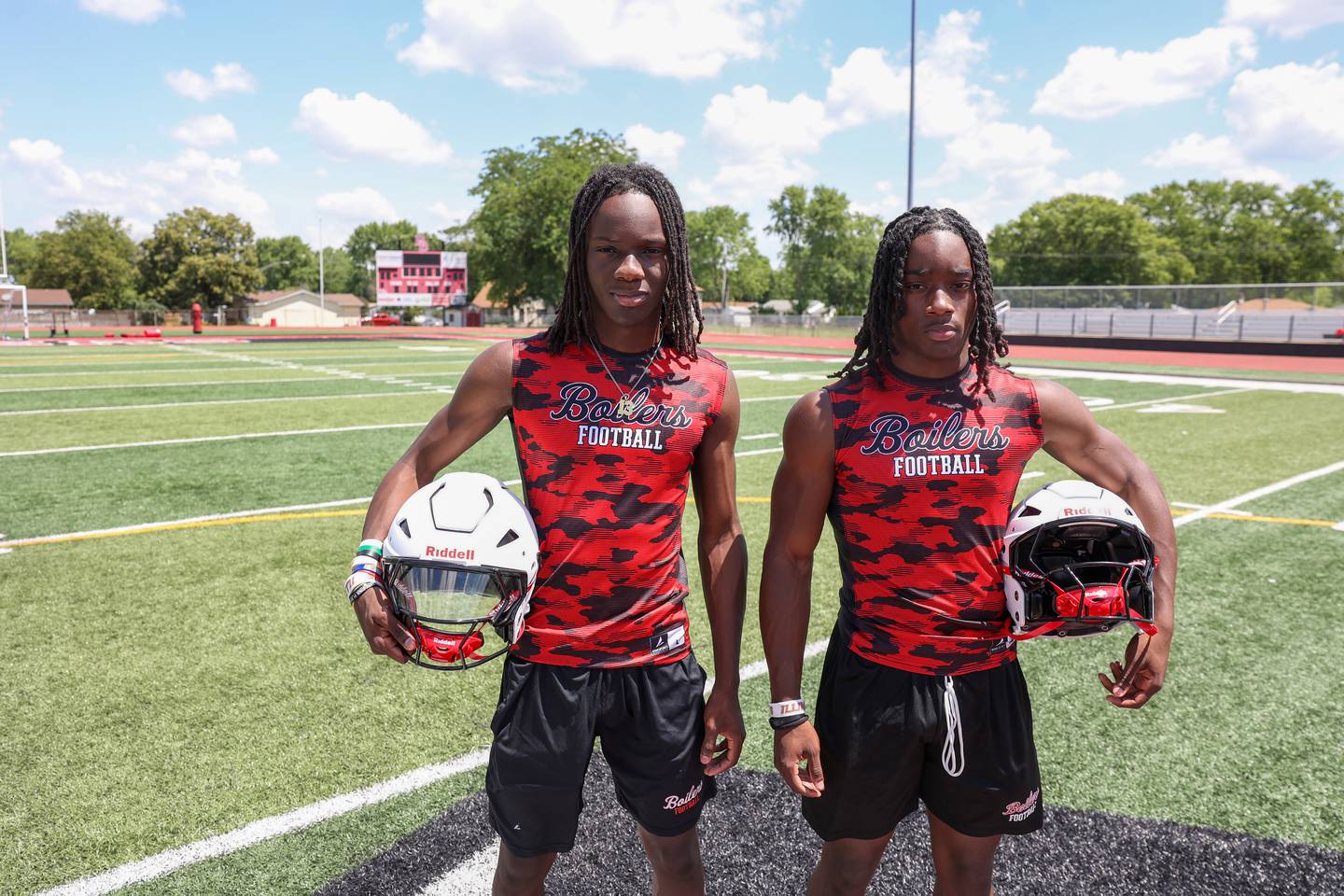 Brothers LyZale, left, and Ky'ren Edmon stand on the football field at Bradley-Bourbonnais Community High School. The senior and sophomore duo are looking to have another successful season as Boilermakers.