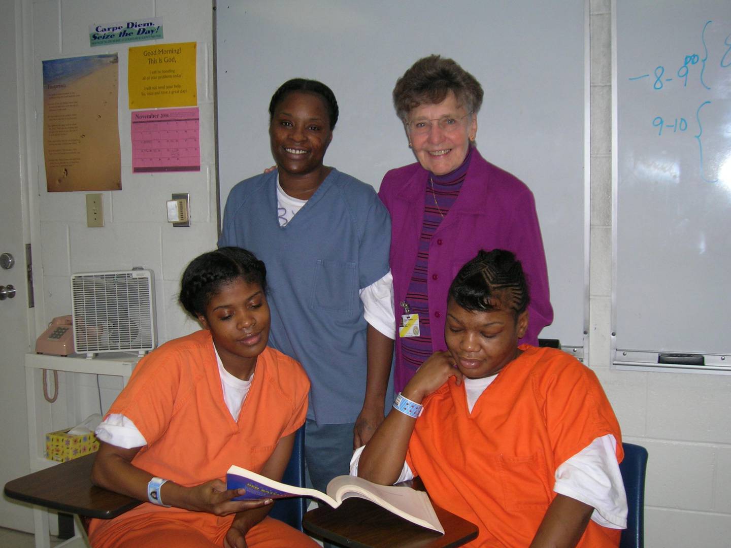 Sister Vivian Whitehead is seen assisting several student residents of the Will County Detention Center in Joliet in this undated photo.