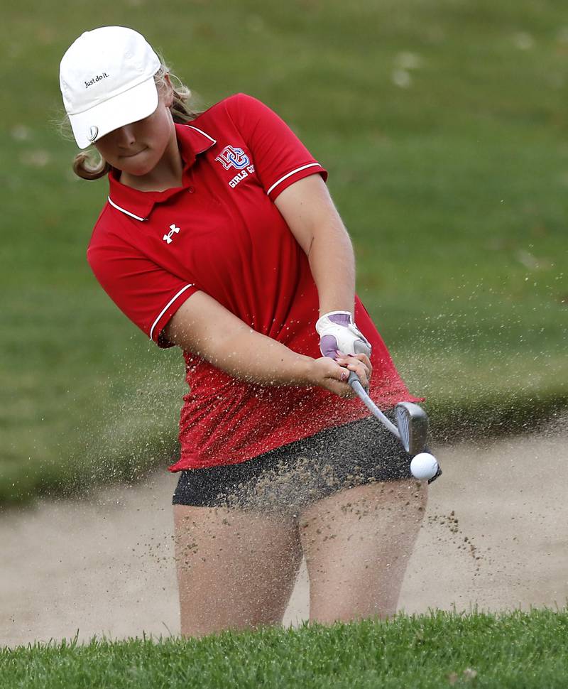 Dundee-Crown’s Ella Ptaszek hits out of the sandtrap on the 18th green during the Fox Valley Conference Girls Golf Tournament Wednesday, Sept. 24, 2025, at Crystal Woods Golf Club in Woodstock.