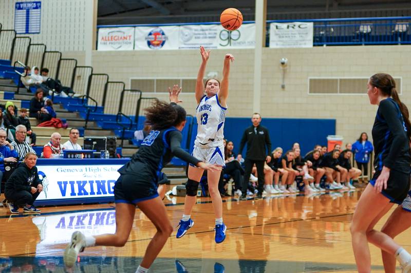 Geneva’s Linnea Popp (13) shoots a 3-pointer against St. Charles North during a game at Geneva High School on Thursday, Dec. 4, 2025.