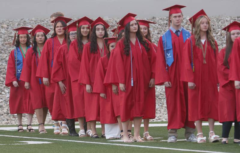 La Salle-Peru Township High School graduates walk to receive their diplomas during the L-P Class of 2026 commencement ceremony on Thursday, May 14, 2026 at Howard Fellows Stadium.