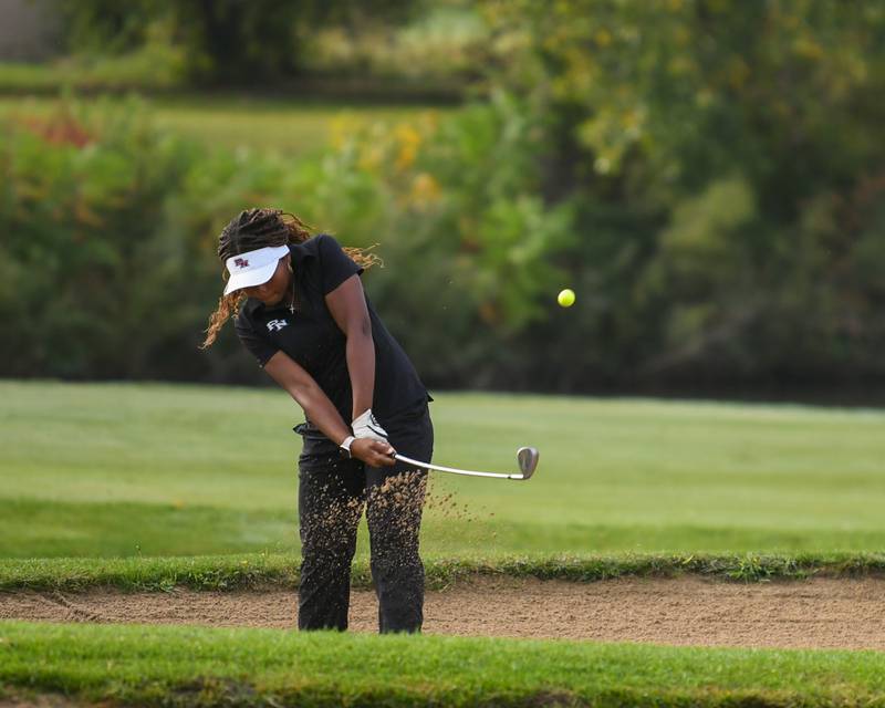 Alesia Haynes of Plainfield North chips out of the sand trap during the Southwest Prairie conference meet on Wednesday Sept. 24, 2025, held at Blackberry Oaks Golf course in Bristal.