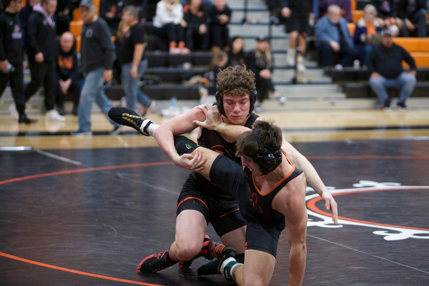 St. Charles East's Brody Murray and Libertyville's Matt Kubas compete in the 175 lb. class at the St. Charles East wrestling meet on Saturday, Dec.2, 2023 in St. Charles.