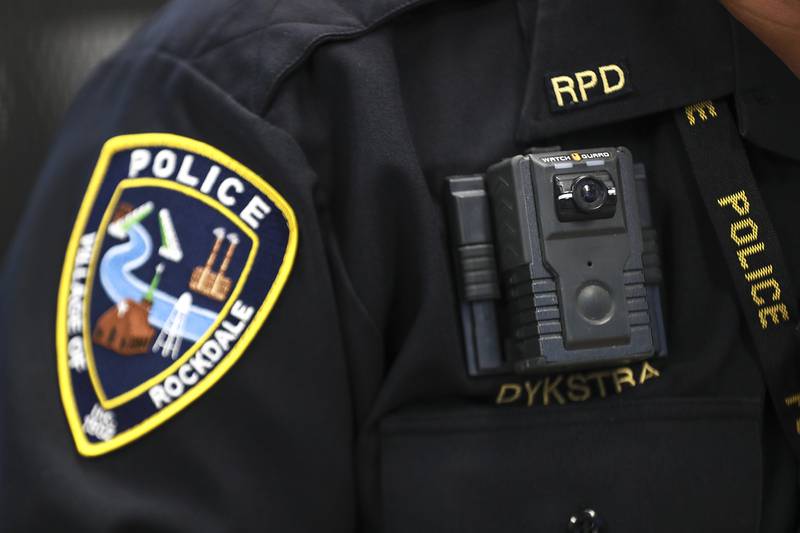 Rockdale Police Chief Robert Dykstra displays a body camera used by the Rockdale police force on Friday, March 26, 2021, at the Rockdale Police Department headquarters in Rockdale, Ill. The Rockdale Police Dept. were one of the first in the county to implement the use of body cameras.