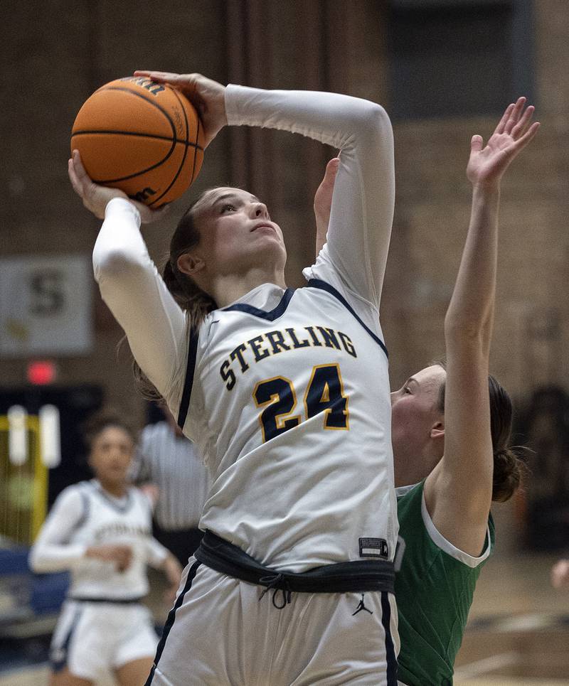 Sterling’s Madison Austin works below the basket against Geneseo Thursday, Jan. 30, 2025, at Sterling High School.
