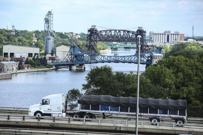 A truck drives along Interstate 80 over the Des Plaines River on Friday, Aug. 11, 2017, in Joliet, Ill.