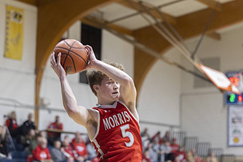 Morrison’s Chase Newman pulls down a rebound against Newman Wednesday, Jan. 3, 2024 at Newman High School.