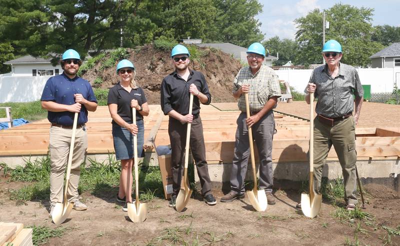 (From left) Michael Zearing, Princeton City Zoning officer,; Teresa Wittenauer, Princeton City manager; Jon J. Scholtes, executive director of Habitat for Humanity of La Salle-Bureau-Putnam Counties; Princeton Mayor Ray Mabry and Lee McCullough member of the board of directors pose for a groundbreaking ceremony on Friday, July 11, 2025 in Princeton. The home is located near the intersection of Cherry and Marquette Street in Princeton. A family of 6, including 4 young children, will move into the home. Volunteers interested in helping with the home are asked to contact to Habitat for Humanity La Salle, Bureau, Putnam Counties by contacting the Peru office. The home should be completed by the end of the year.