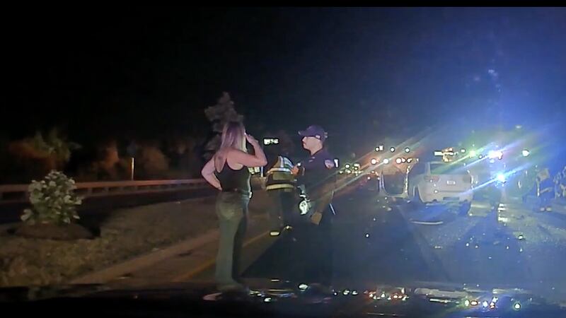 A still from a police squad vehicle video of Ragan Freitag Pattison (left) at the scene of a four-vehicle crash on July 9, 2022, in Plainfield.