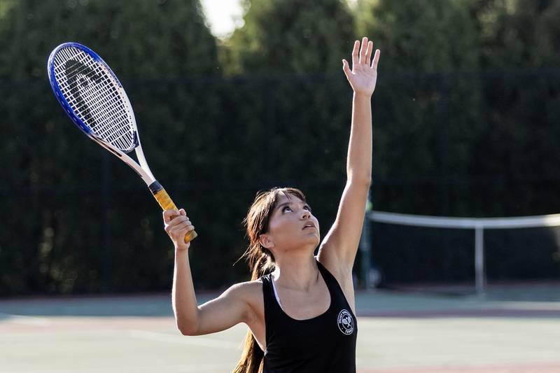 Joliet Township’s Ariel Smith competes in varsity doubles tennis during a match against Joliet Catholic at Joliet West on Sept. 29, 2025.