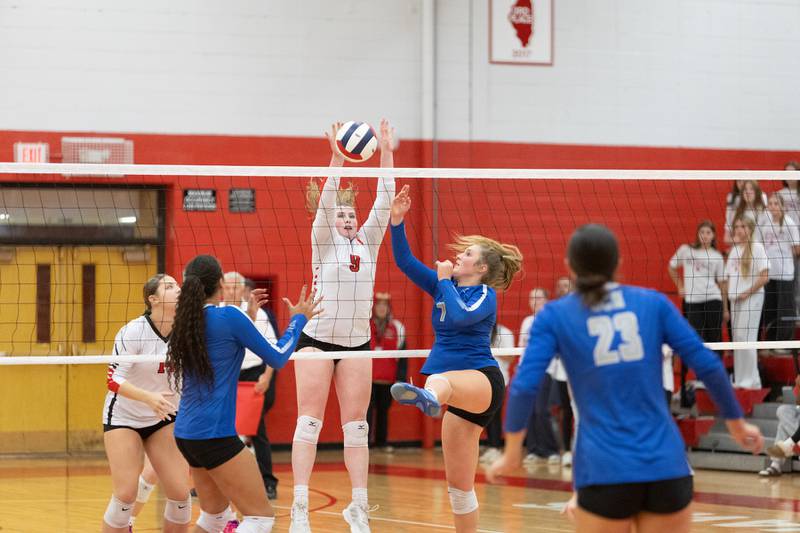 Naperville Centrals Caroline Impey goes for the block against St. Charles North at the Class 4A Regional Final on Thursday, October 30,2025 in Naperville.