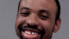 Man accused of punching Joliet liquor store employee