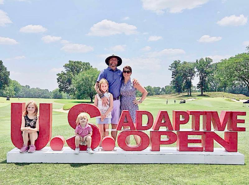 Justin "Tank" Van Landuit had his team with daughers Raynor (from left), Ryker and Rourke and his wife, Erin, to play in the U.S. Adaptive Open for golfers with disabilities at Woodmont Country Club in Rockville, Md.