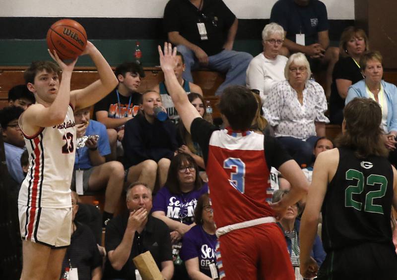 Huntley's Ethan Blackmore shoots the ball over Marian Central's Braedon Todd during the boy’s game of McHenry County Area All-Star Basketball Extravaganza on Sunday, April 14, 2024, at Alden-Hebron’s Tigard Gymnasium in Hebron.