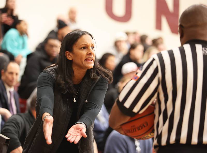 Fenwick's coach Lenae Fergerson pleads her case to the referee during the girls 3A varsity super-sectional game between Nazareth Academy and Fenwick High School in River Forest on Monday, Feb. 27, 2023.