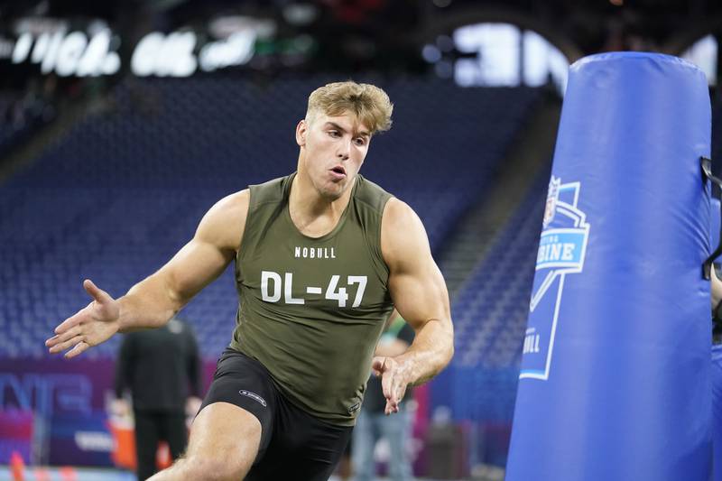 Iowa defensive lineman Lukas Van Ness runs a drill on March 2 at the NFL Scouting Combine in Indianapolis. Van Ness, a Barrington High School graduate, is widely anticipated to be taken in the first round of the 2023 NFL Draft.